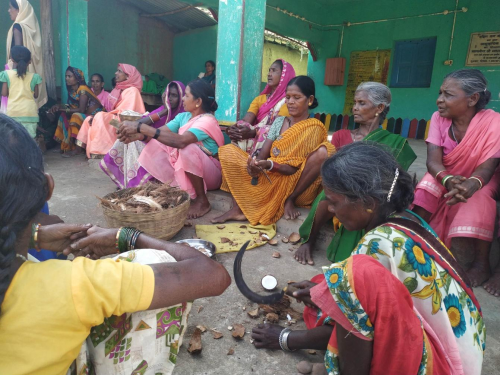 Women bought coconut from the money they collected and distributed it among themselves as the part of a collective effort to earn so much offerings.