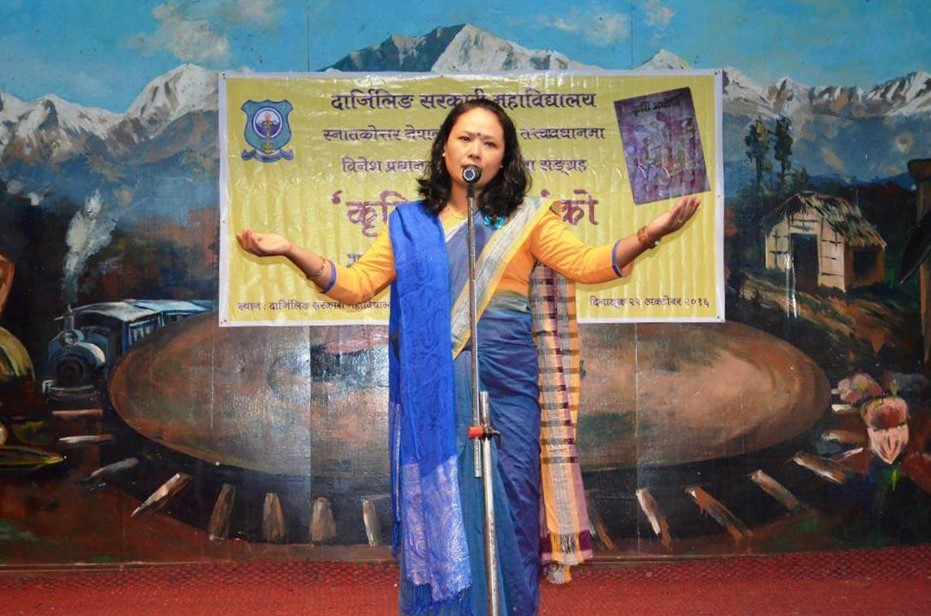 Fig. 1: Pavitra Lama performing her poem ‘Asaari’ at the vimochan samaroh (inauguration ceremony) of the Indian Nepali author, Binesh Pradhan’s Kriti Adhiti, a collection of critical essays, held at Darjeeling Government College, Darjeeling, West Bengal on October 22, 2016 (Courtesy: Sherap Bhutia)