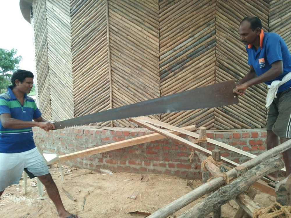 artists working on wood with Pandit Ram