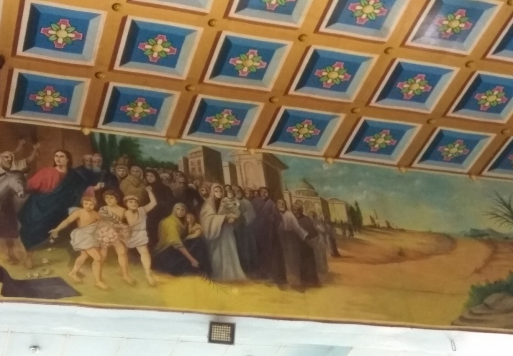 Fig. 26 The two side registers are used to paint saints and local traditions.