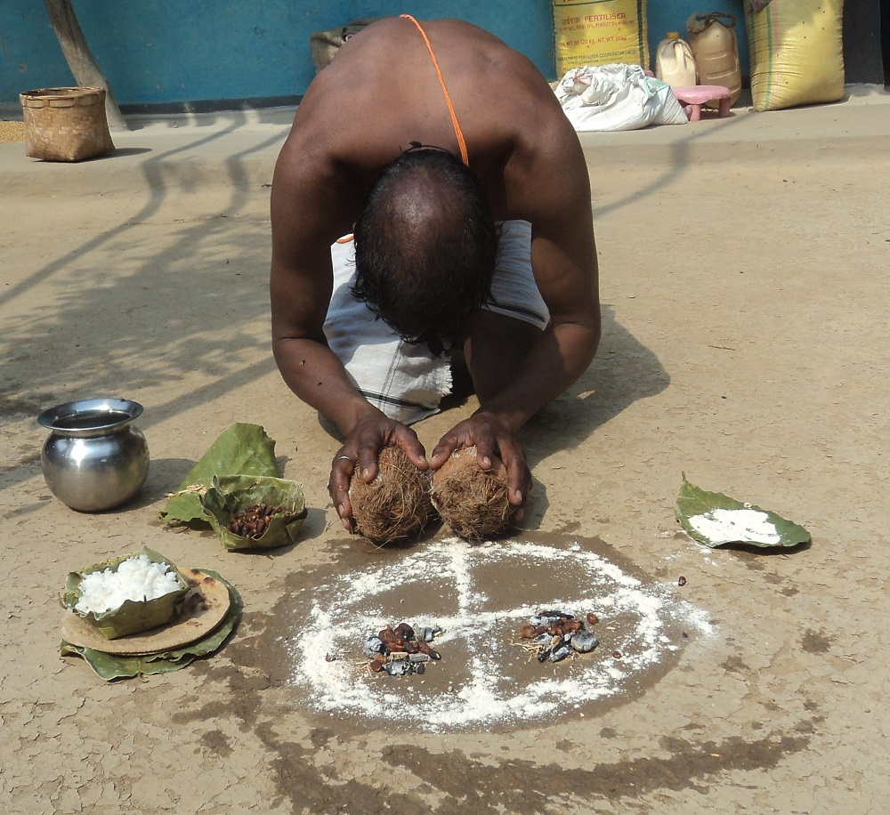 Offering Mahua to village deity
