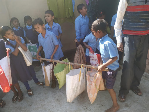 Kids from primary school of the village visit the houses with their teachers.