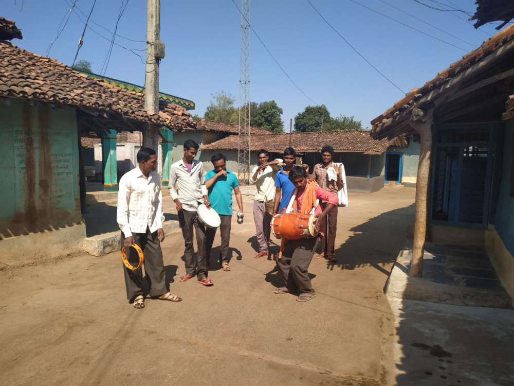 Group of men with all the instruments come along singing and dancing to get their share of offering.