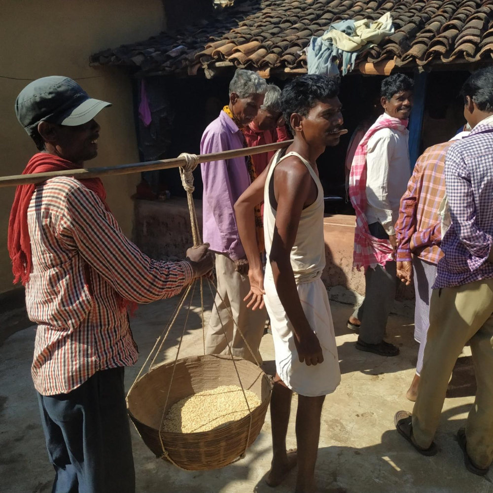 Group of men (age group 25-50 years) collected their share and departed with smile.