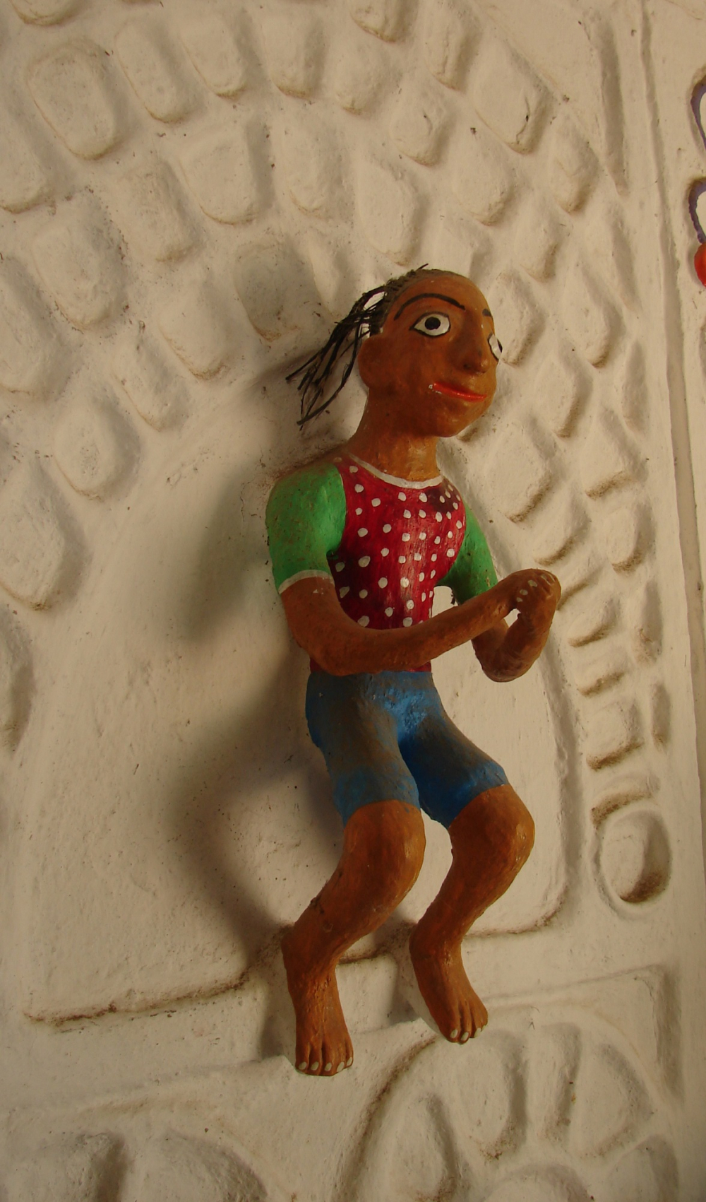 Clay relief on training centre walls