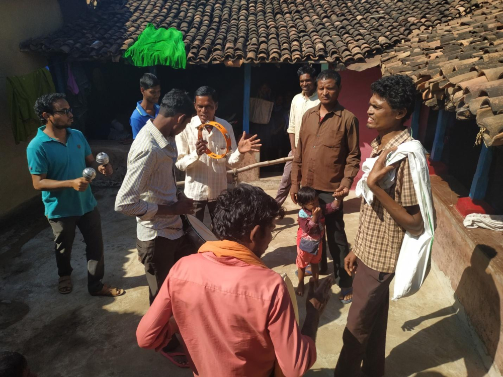 Group of Nacha (dancing troop) is entertaining the people around to get more offerings.