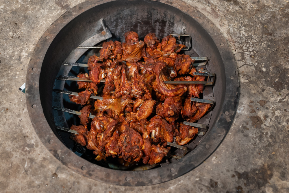 Meat cooked in a silo to prepare Aurangabadi mandi at Zama Khan’s eatery. (Picture Credits: Rushikesh Hoshing)
