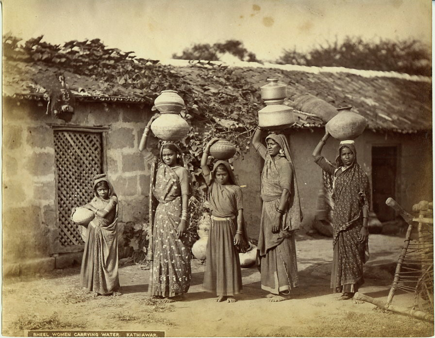 Bhil women Carrying water on their head - Kathiawar in the 1880s_Wikimedia Commons