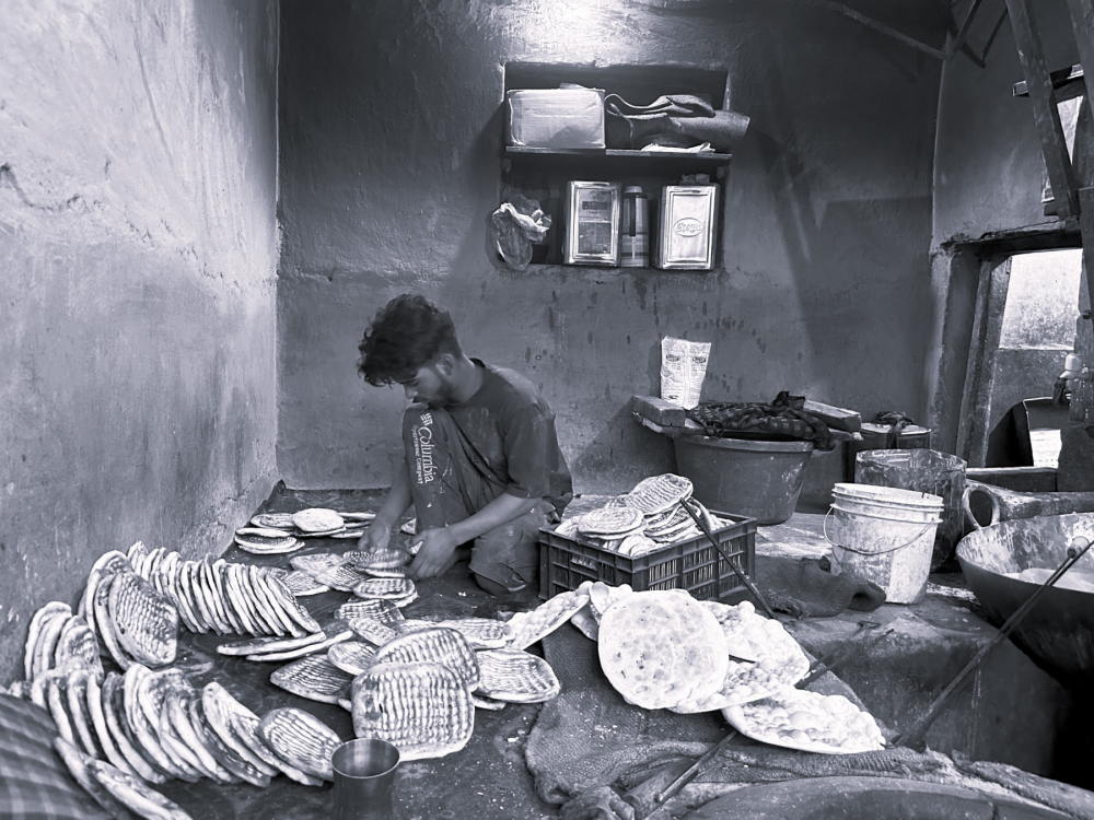Counting the breads for distributorship. (Picture Credits: Taha Mughal)