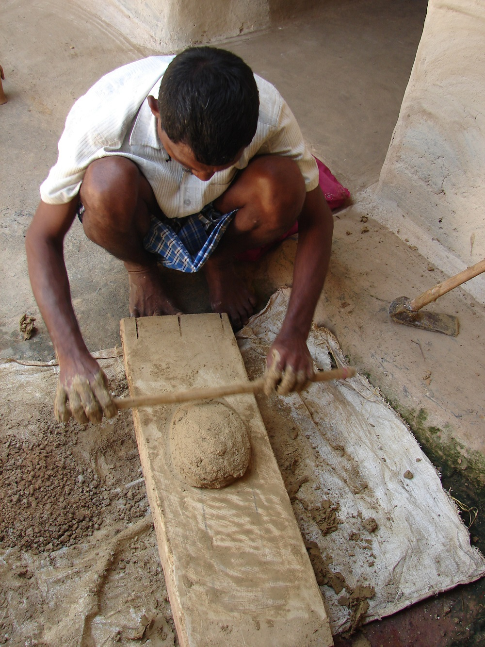 removing stones from clay