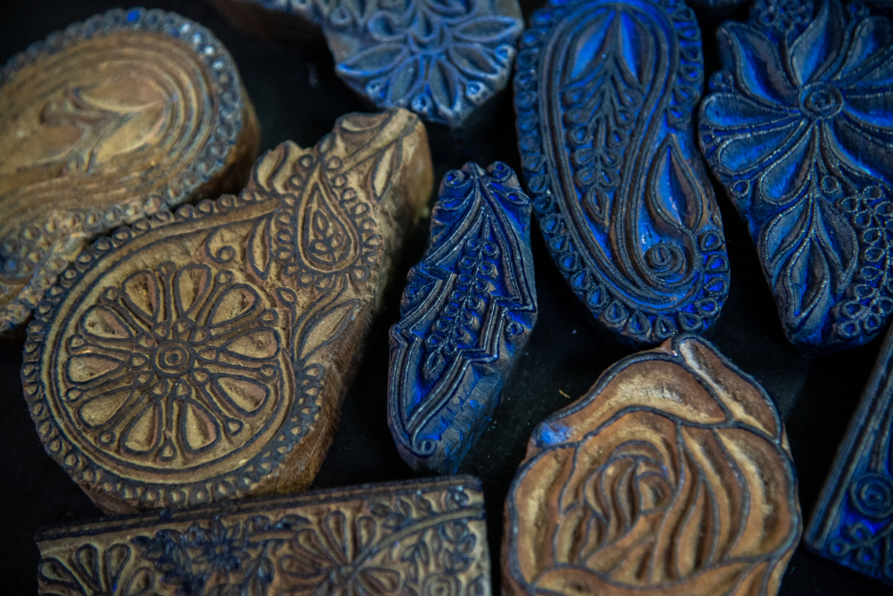 Wooden blocks are used to create patterns for the embroidery. (Picture Credits: Monis Khan)