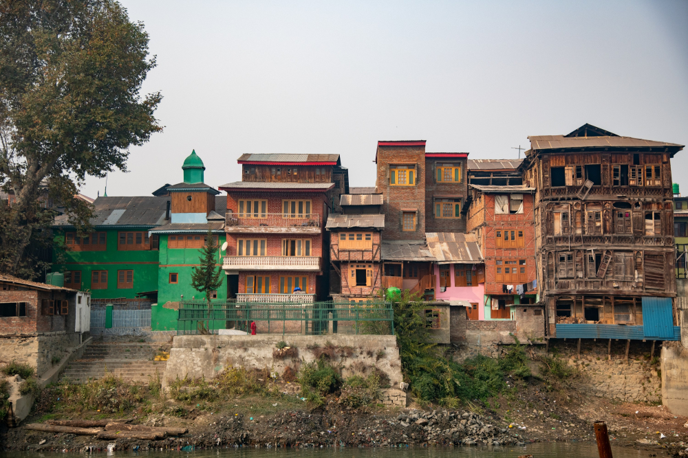 Traditional homes along the Jhelum River (Vitasta), built with elevated floors to guard against flooding. (Picture Credits: Syed Muneeb Masoodi)