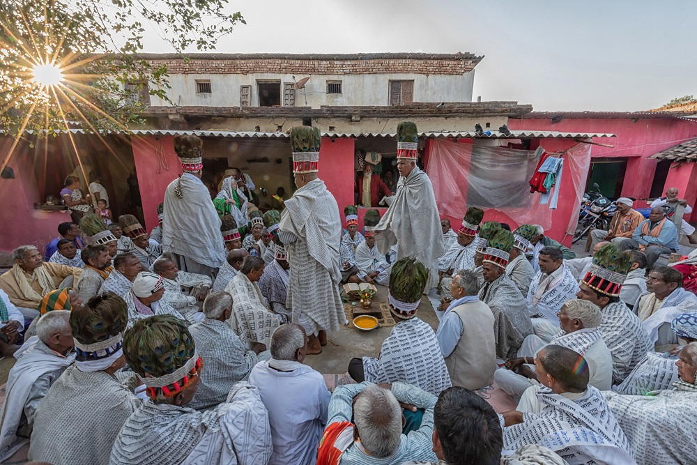 Ramnamis in a Goshti with their Peacock Head-Dress