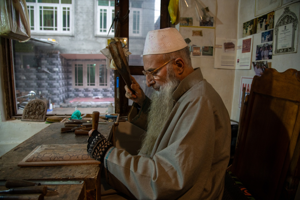 Ghulam Nabi Dar, Padma Shri laureate and master walnut woodcarver from Safa Kadal.