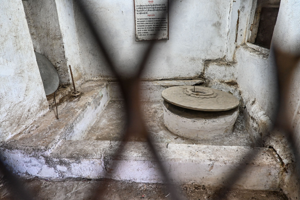 Water rotates the blades of the water mill. (Picture Credits: Anil Purohit)