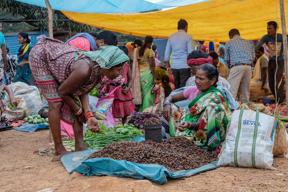 a Woman Selling Mahua in the local Market