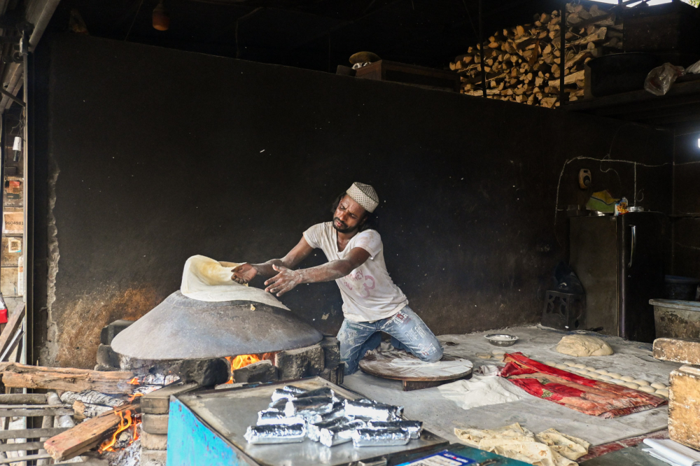 Preparing roomali roti. (Picture Credits: Anil Purohit)
