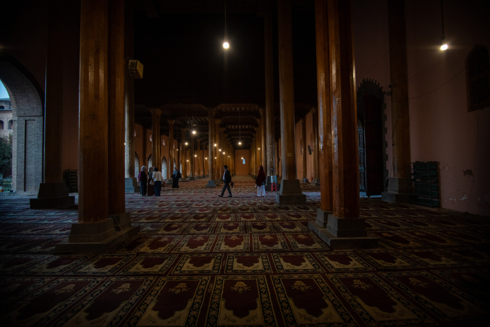 Interiors of Jamia Masjid, featuring grand wooden pillars showcasing Kashmiri craftsmanship. (Picture Credits: Syed Muneeb Masoodi)