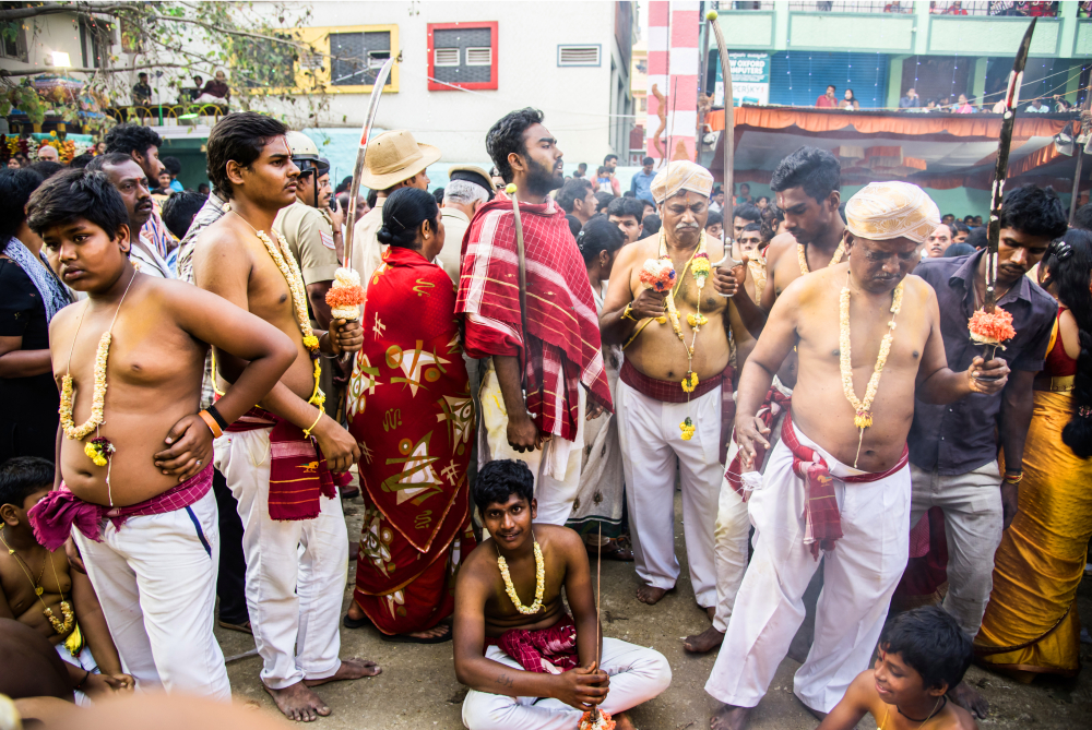 Fig. 2. A group of veerakumaras on one of the Gange puje days, resting in between the events (Photo courtesy: PEEVEE)  