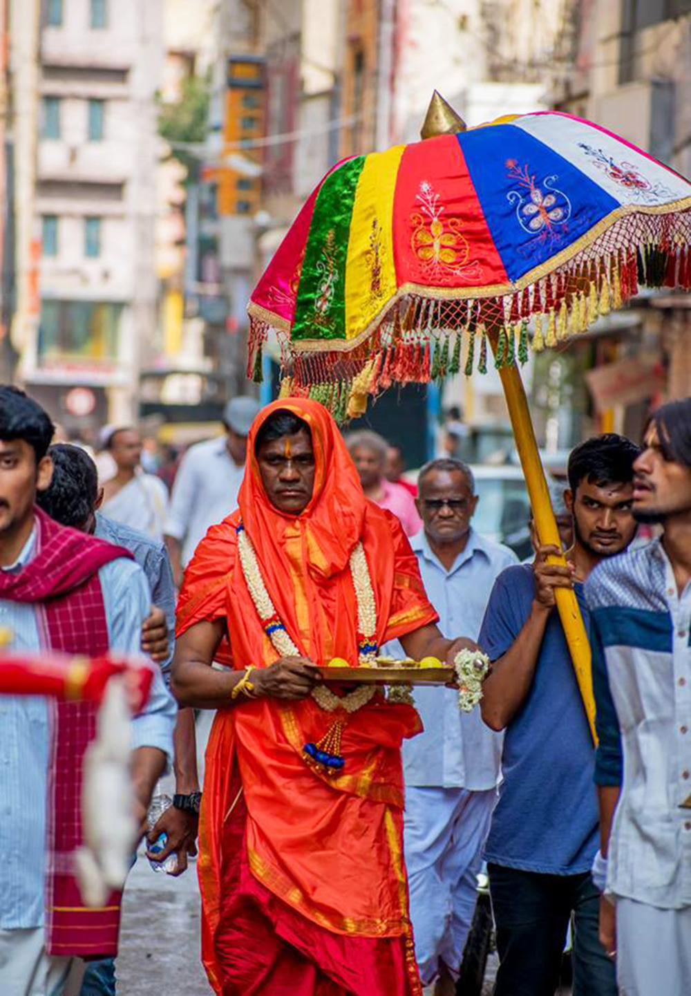 Fig. 4. One of the secondary priests on his way to a temple in Majestic to perform Gange puje (Photo courtesy: Prashanth B. Vepuri, Revival Heritage Hub)
