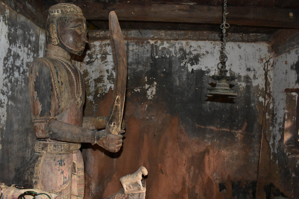 Fig. 2: A daivakone with its daiva, Deroddu Guttu, Nitte. This guttu is almost 100 years old and the room where the guardian spirits are placed has never been repaired or reconstructed 