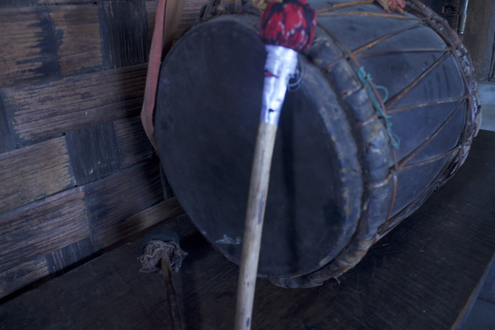 Fig. 6:  A traditional nkhuangh made with cane ropes. The drums in the old days used all the same materials except for metal wires. The naturally available cane ropes were used to bind and hold the membranes of the drums together; however, they had tobe rewired once in a while especially for the nkhuanghs played regularly (Courtesy: Ramrisuang Pamei)