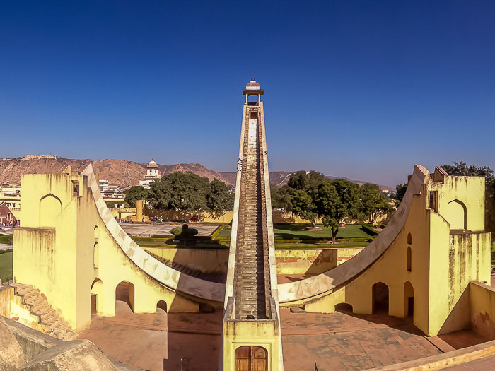 Fig. 1: The Samrat Yantra is a large dhoopghadi built at the Jantar Mantar in Jaipur. Its huge gnomon casts a shadow on its curved, calibrated base, enabling one to tell the solar time