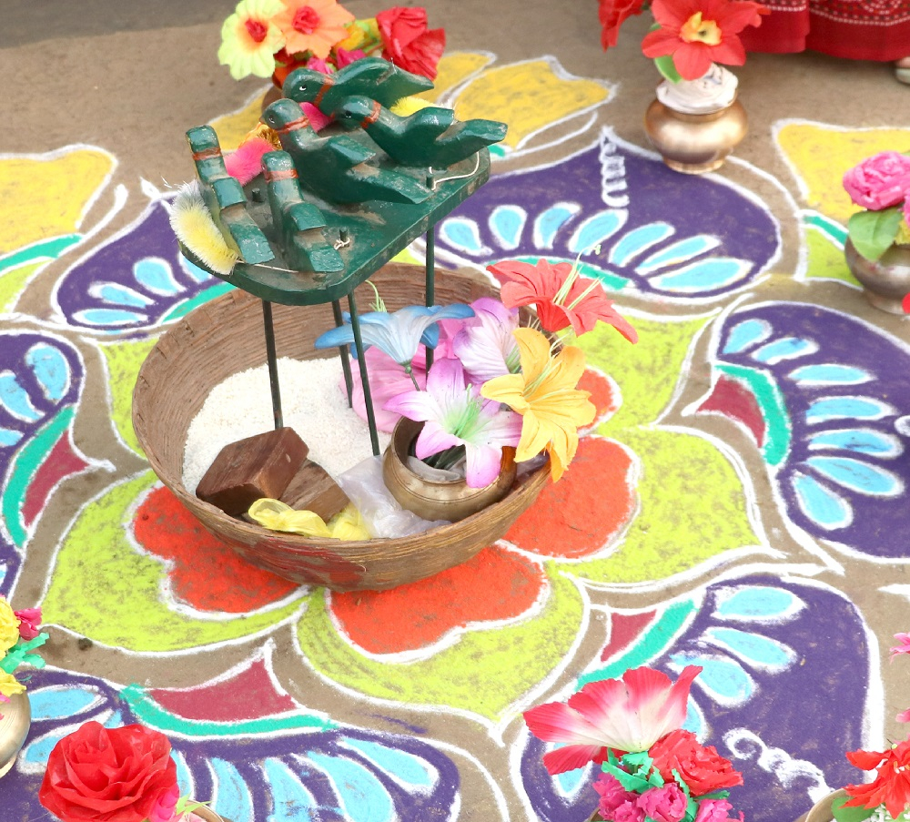 Wooden Parrots with Paddy in a Basket