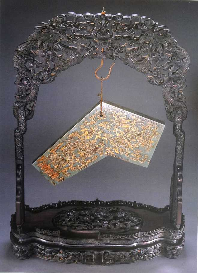 Imperial Jade chime - Dark green nephrite jade with gilt decoration - Qing Dynasty, China_dated 1764 CE_Sir Ratan Tata Collection, Mumbai_The Tribune