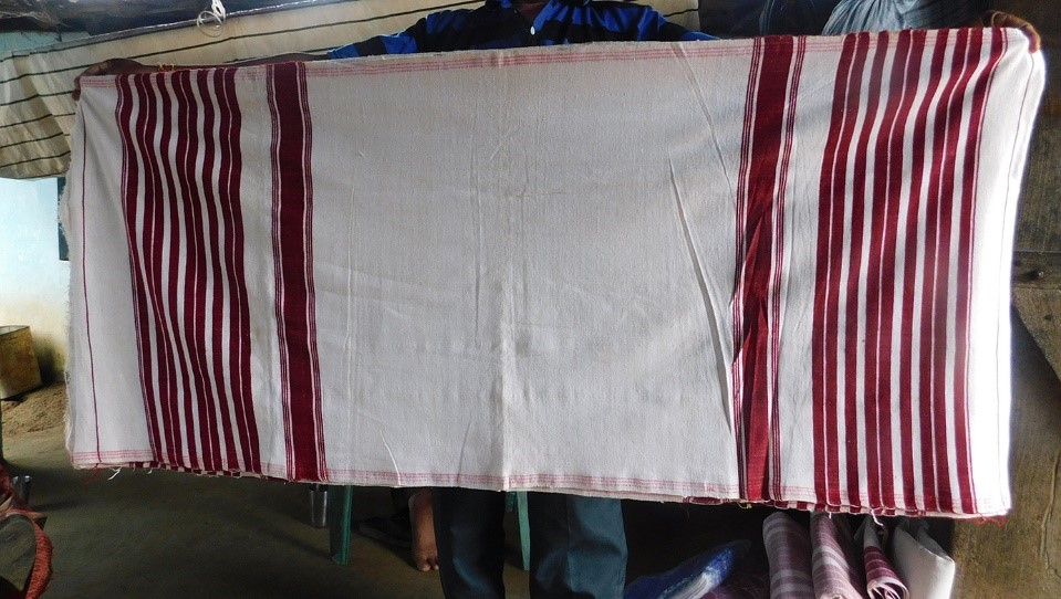 Fig.2.गमछा – इसका प्रयोग कई रूपों में होता है | (सौजन्य: सरोज केरकेट्टा)