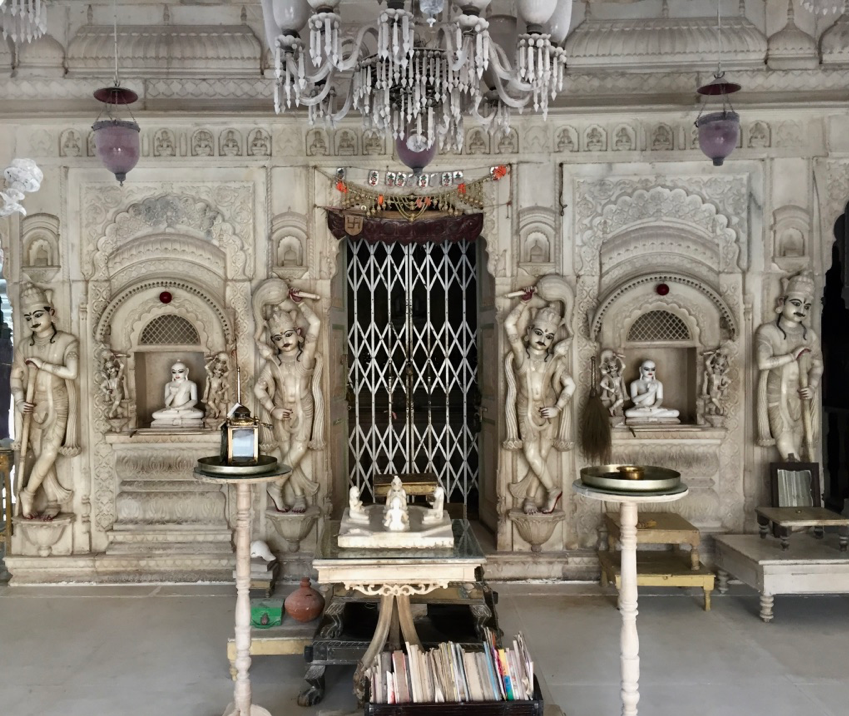 Fig 1: Interior of the Shree Vimalnathji Temple, with jina figures, books and other objects of ritual aid in Jiaganj, West Bengal. (Courtesy: Mrinalini Sil)