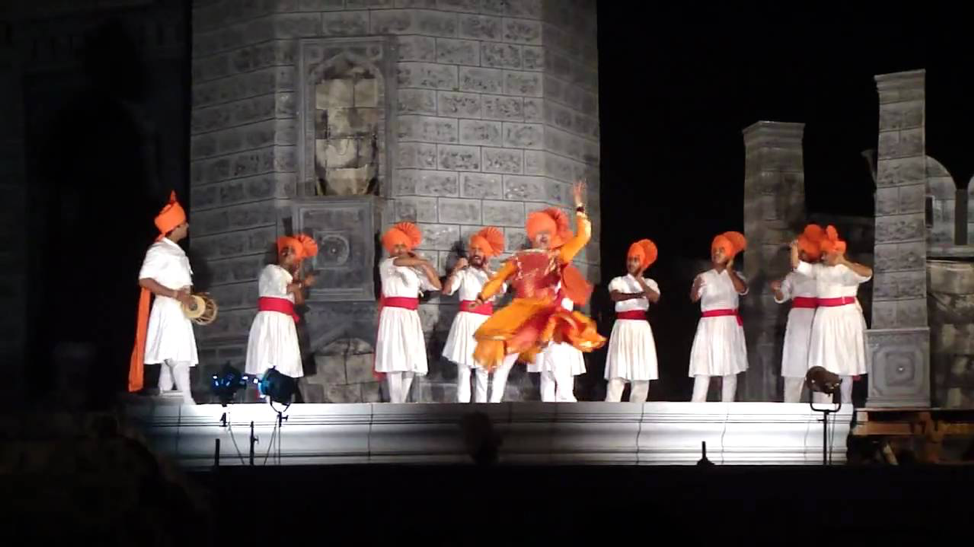 The shahir and his chorus group called ‘phad’ in a proscenium play Janata Raja (Courtesy: mrsush007’s YouTube channel)