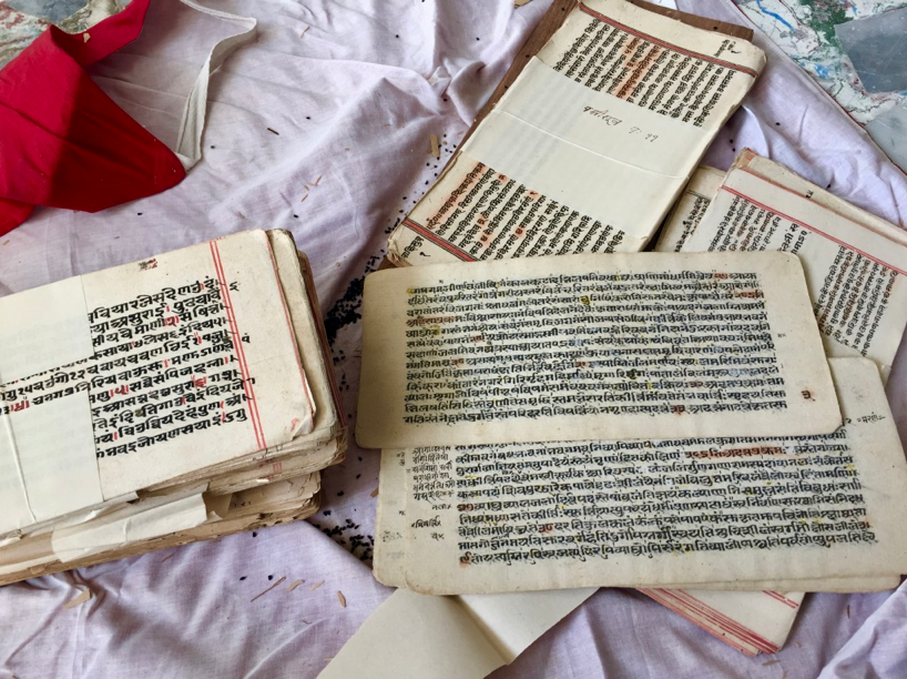 Fig 3: An open bundle of the textual handwritten manuscripts in  Shri Neminathji Bhandar Temple, Azimganj (Courtesy: Mrinalini Sil)