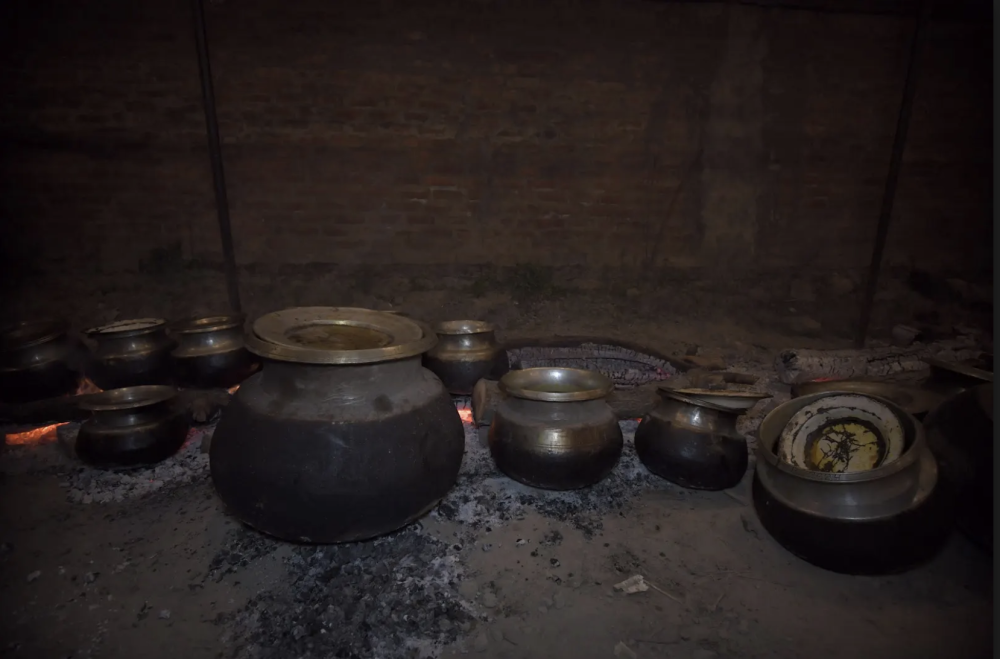 Wazwan being prepared in traditional daigs. (Picture Credits: Syed Muneeb Masoodi)