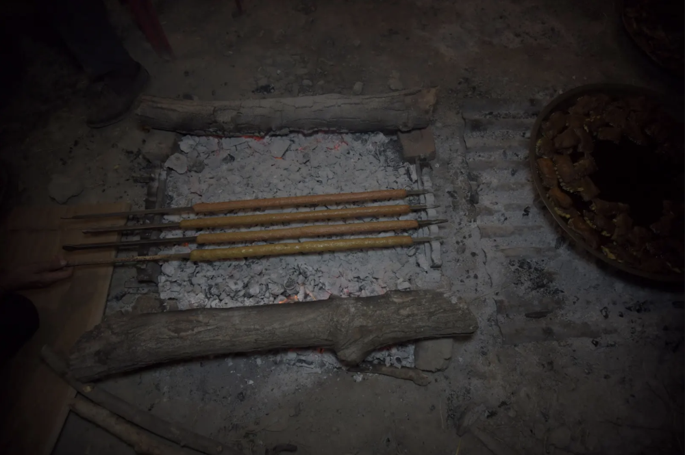 Seekh kebabs being grilled over charcoal. (Picture Credits: Syed Muneeb Masoodi)