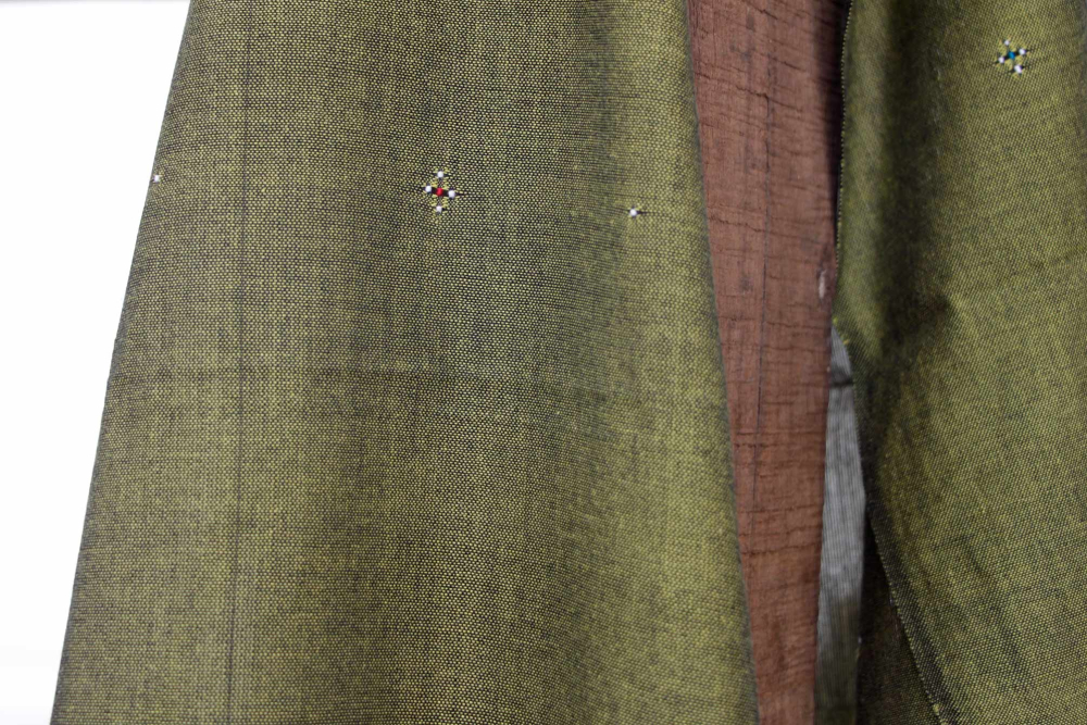 Each little dot is woven individually, and eventually a motif is transferred from the weaver’s mind onto cloth, with no help of paper and pen. 