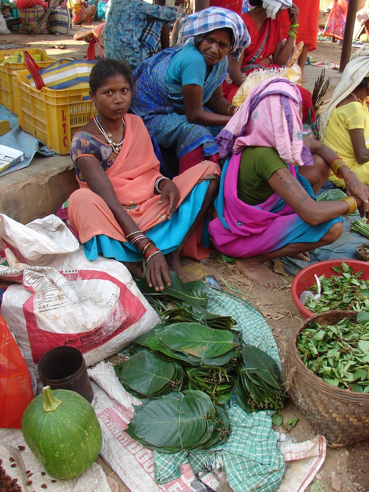 Woman selling dona pattal in a local market