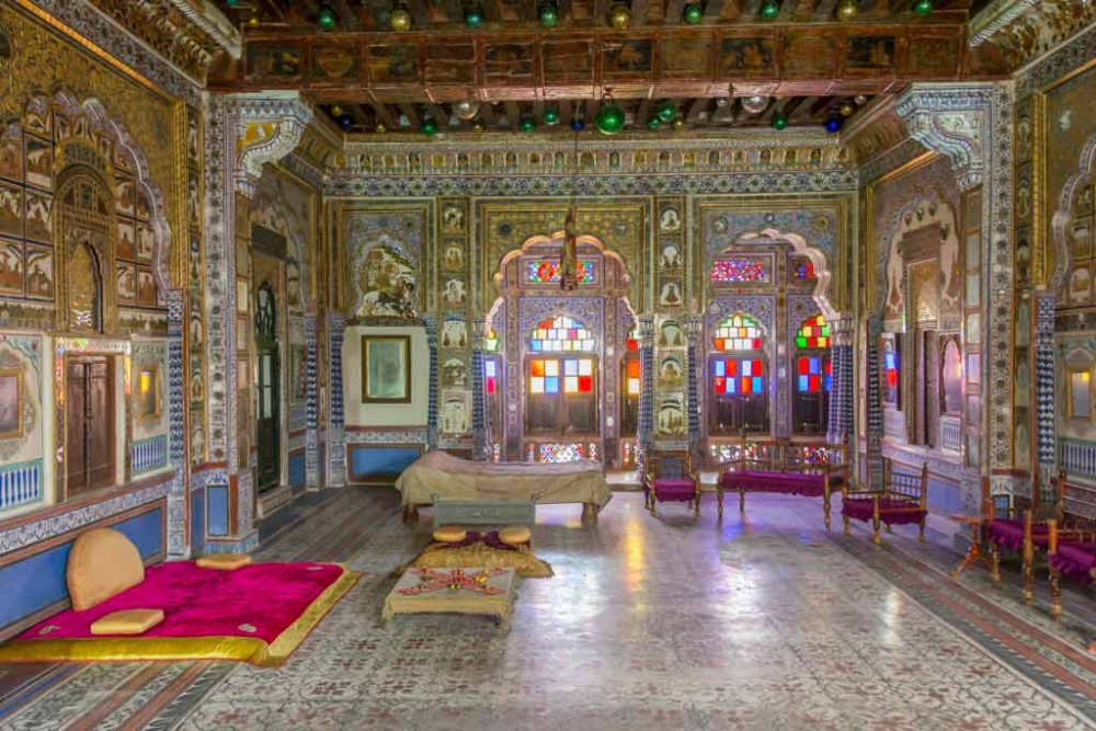 Fig. 4 Takhat Villas, bedroom of Maharaja Takhat Singhji. This room is decorated with paintings, stained glass and Christmas balls. Not just the walls and ceiling but the floor is also painted in this period room.