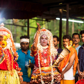 The Tuluvas engage spiritually with a host of local spirits and deities during the annual celebration of Bhuta-Kola; bhuta meaning spirit and kola meaning play or performance, in the Tulu language. During the ritual, oracles summon bhutas and are temporarily possessed by them, forecasting future events or acting as mediators to provide moral guidance and resolve legal disputes.