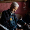 A community member from the catchment area of Mandakini ki Awaaz tunes his radio set to 90.8 MHz to listen to the daily broadcast of the community radio station (Still from the film, A Radio of One’s Own)