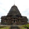 Back view of Lakshmi-Narasimha Temple, Harnahalli, with the main shrine flanked by two sanctums, and an ornate tower and a circumambulatory path (Courtesy: Poorva Salvi)